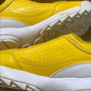 Yellow Fila shoes